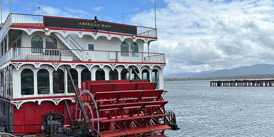 view of red paddle wheel on American West river boat